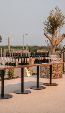 Outdoor wine tasting table at Estancia Vigil